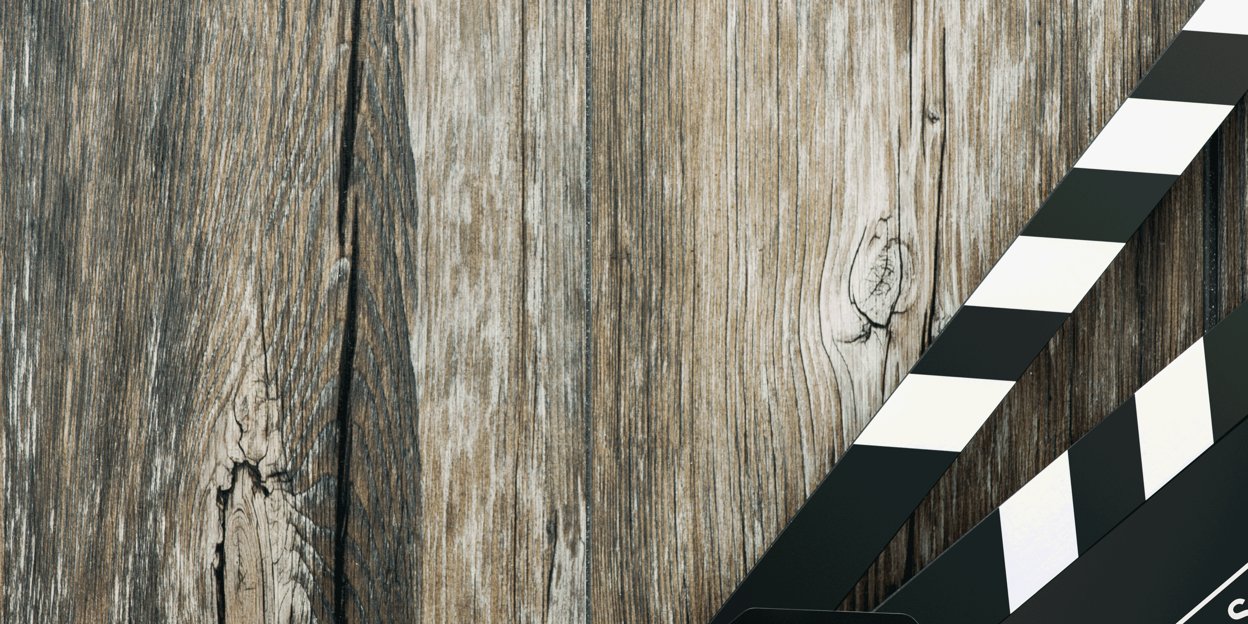 clapper-board-on-wood-PU5FLGF